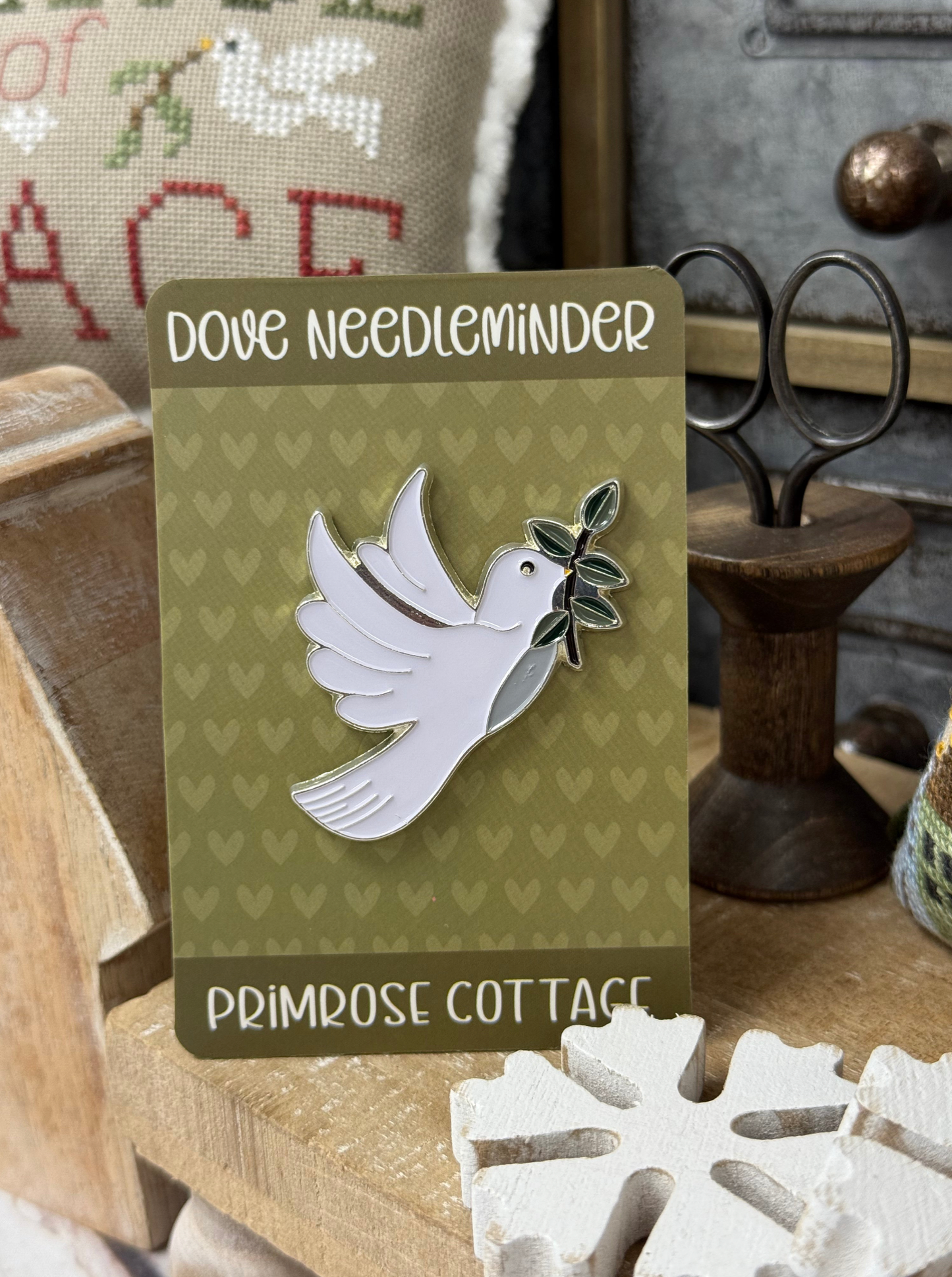 Dove Needleminder